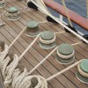 Row of Rope Pulleys on Sailboat Deck